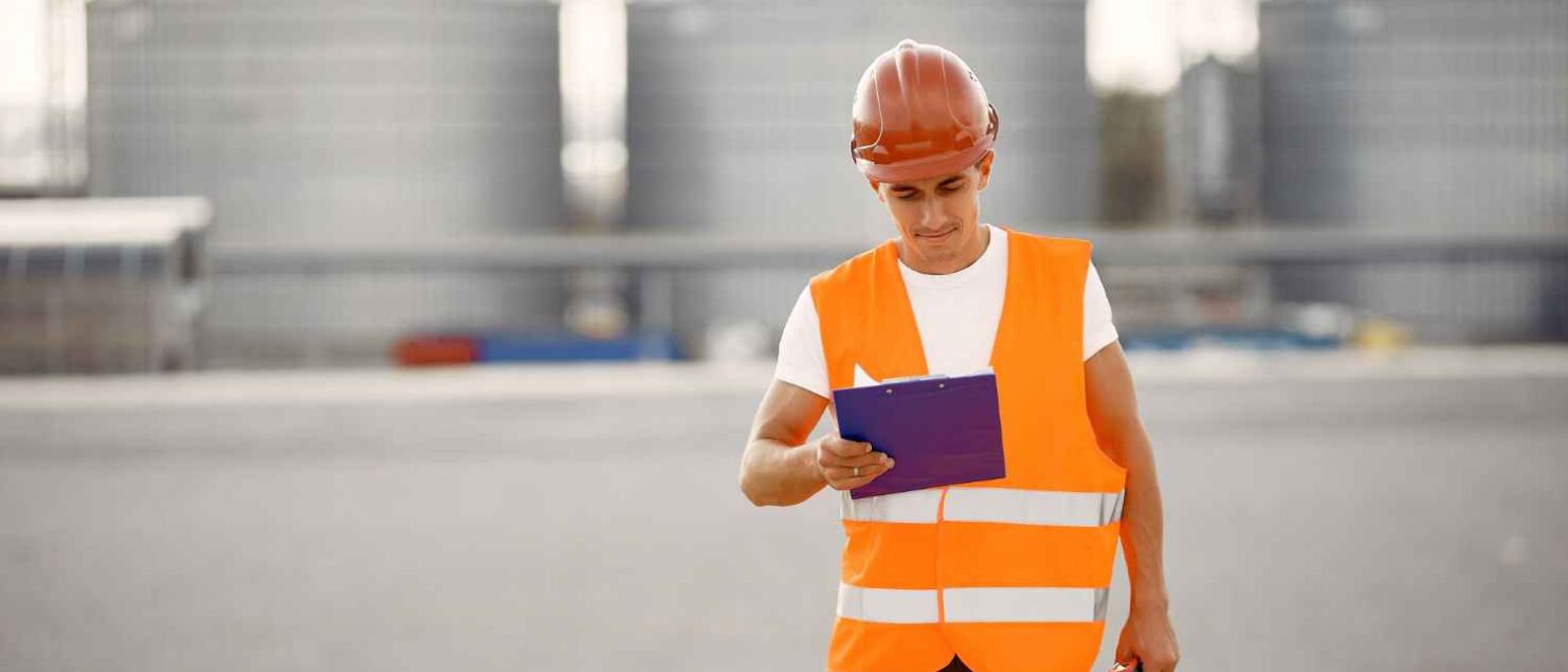 Drone inspecting industrial storage tank